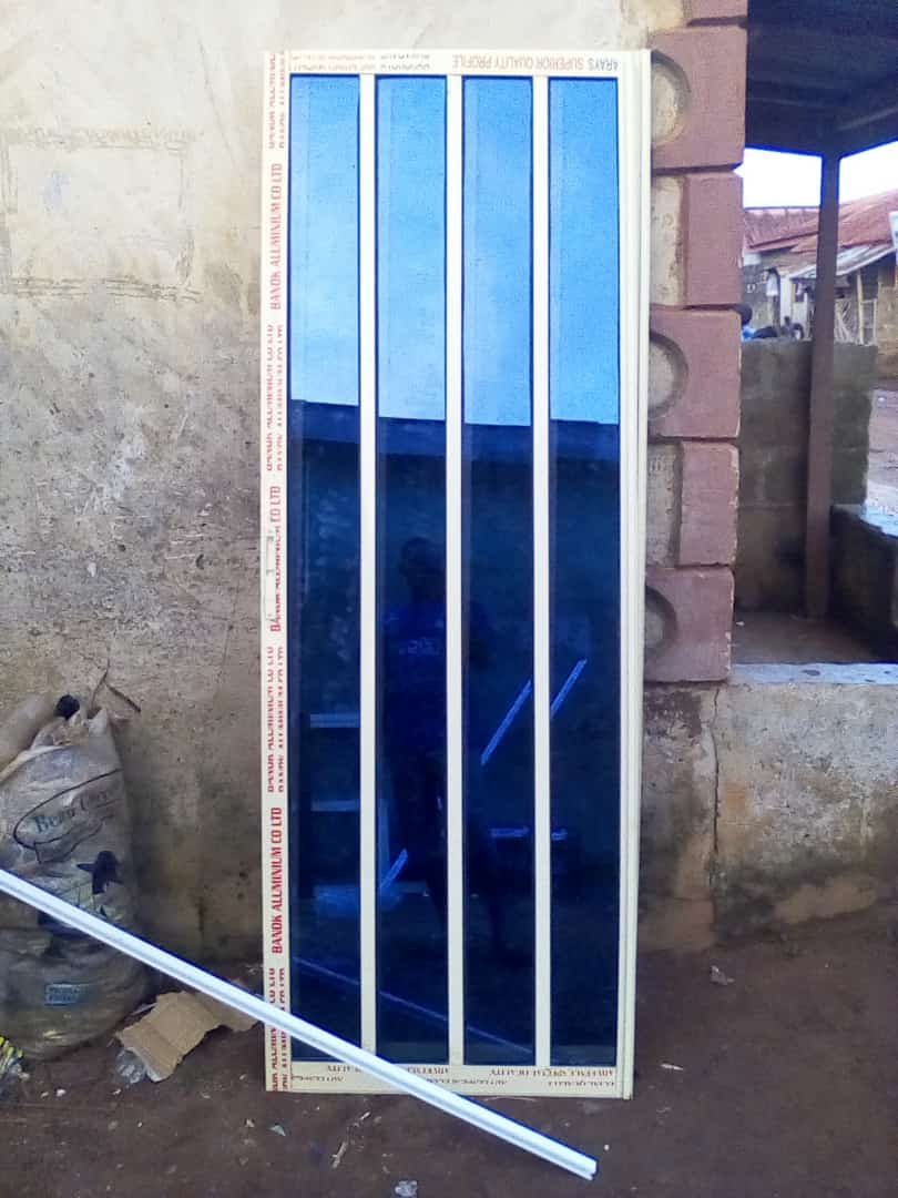 Aluminium sliding door fabrication and installation by ServoraPrise in Nigeria
