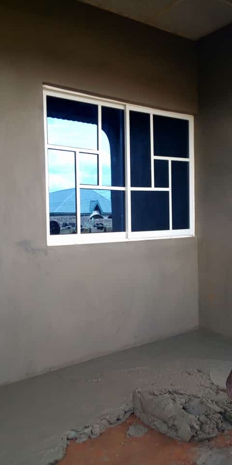 Custom aluminium sliding window installation project by ServoraPrise in Nigeria