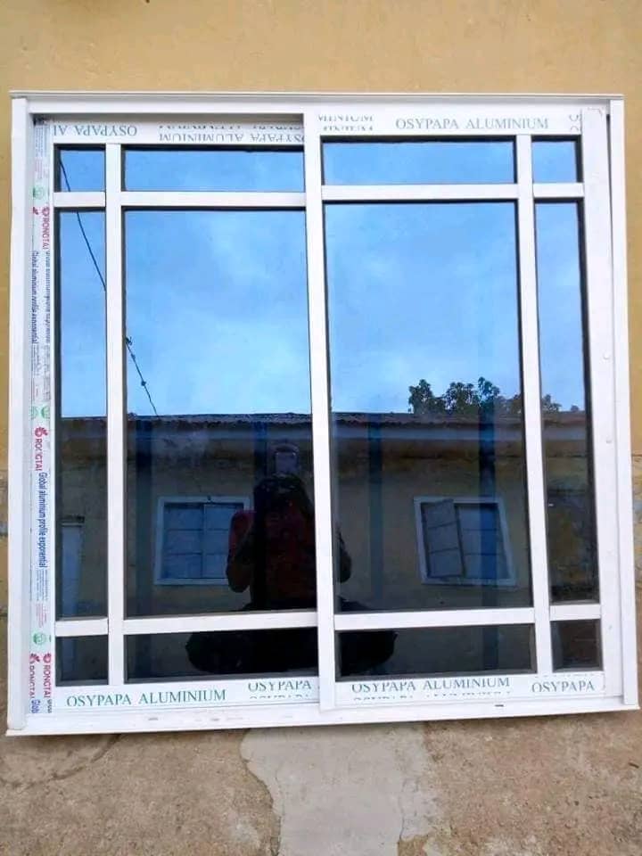 Fully installed aluminium sliding window by ServoraPrise fabrication team in Nigeria